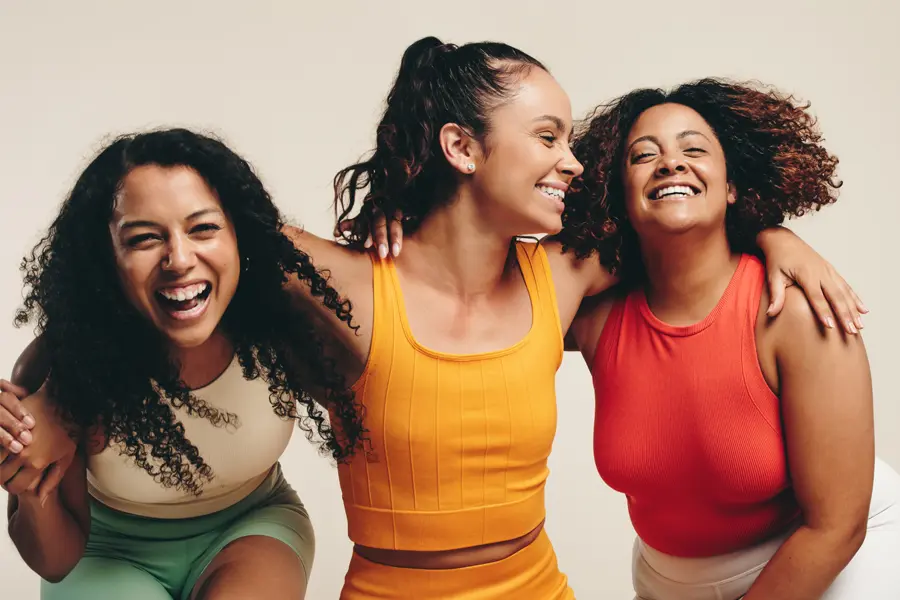 43-Day-HCG-Weight-Loss-Clinic Three woman embrace joyfully. Learn about the 43-day HCG weight loss program at Jennifer Jose-Cappola, MD in Stamford.