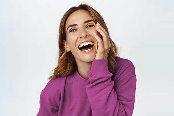 Frotox-Cryotherapy-Clinic A smiling, beautiful brown-haired woman with great skin. Schedule Frotox Cryotherapy facial treatment from Jennifer Jose-Cappola, MD in Stamford.