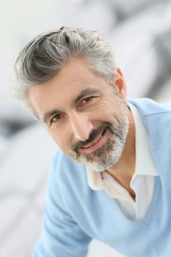 Hair-Restoration-Cryotherapy-Treatment A middle-aged man with thick, even hair. Get hair restoration cryotherapy from Jennifer Jose-Cappola, MD in Stamford.