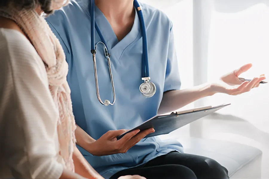Internal-Medicine-Clinic A medical professional explains results to a patient. Get Internal Medicine services from Jennifer Jose-Cappola, MD in Stamford.