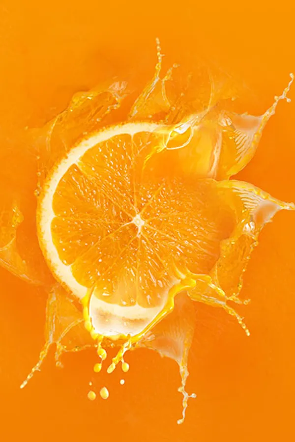 Natural-Defense-IV-Drip-Treatment An orange splashing into orange juice. Get a Natural Defense IV Drip from Jennifer Jose-Cappola, MD in Stamford.
